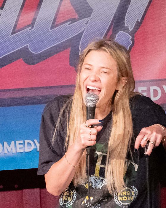 Comedian on stage at Totally! Comedy Show at Bar Lubitsch