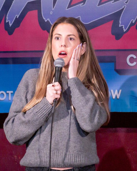 Comedian on stage at Totally! Comedy Show at Bar Lubitsch