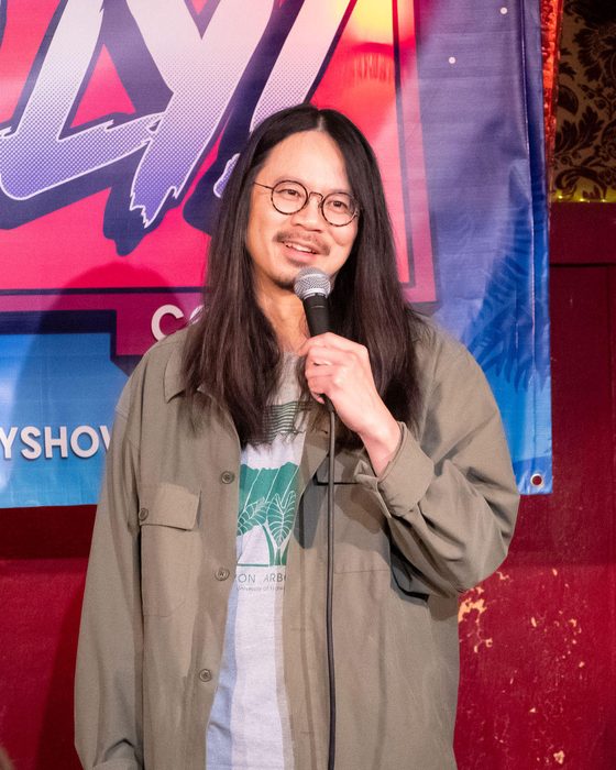 Comedian on stage at Totally! Comedy Show at Bar Lubitsch