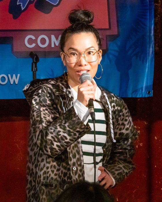 Comedian on stage at Totally! Comedy Show at Bar Lubitsch