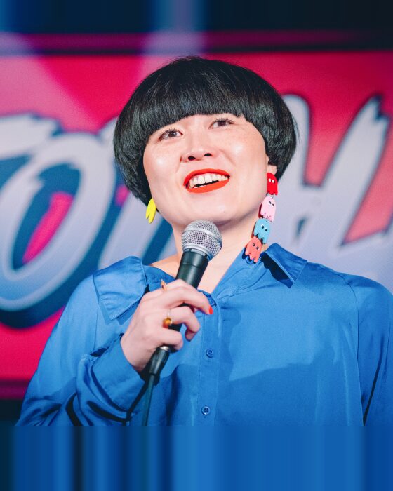 Comedian on stage at Totally! Comedy Show at Bar Lubitsch